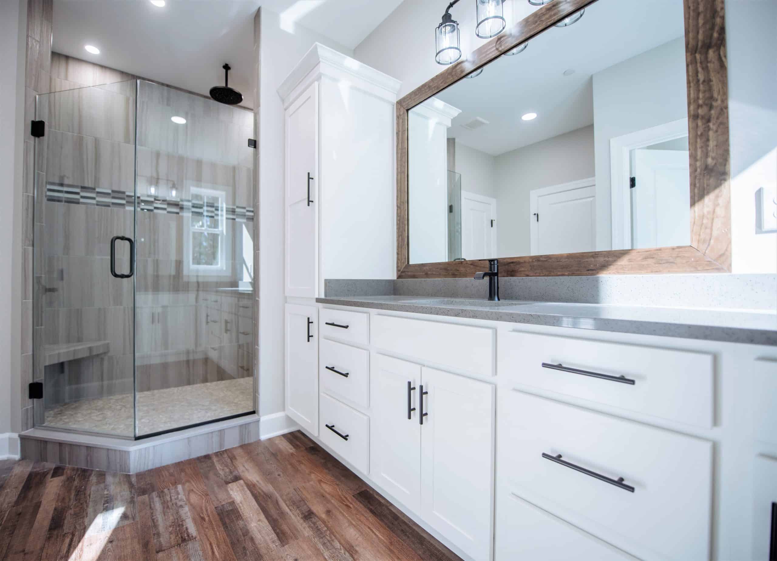 Drawers, Mirror, and Frameless Glass Shower | Bathroom Remodeling